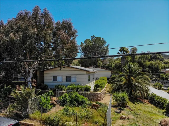 Guest house and 2-care garage behind.
