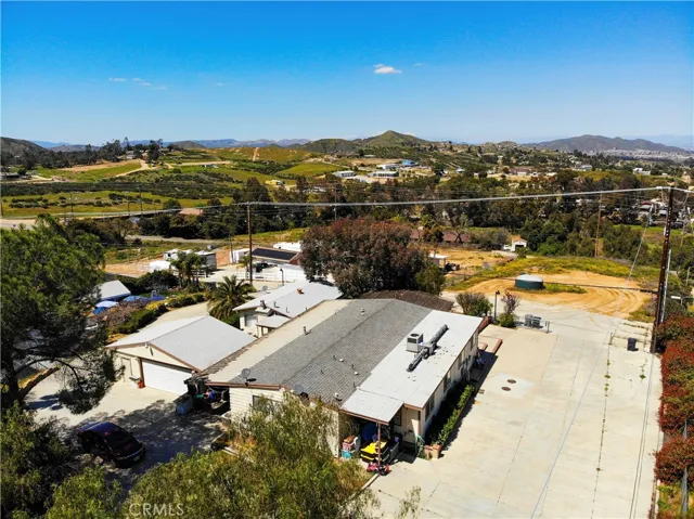 Beautiful panoramic views on the hill. Plenty of paved areas for RV's, boats and more!