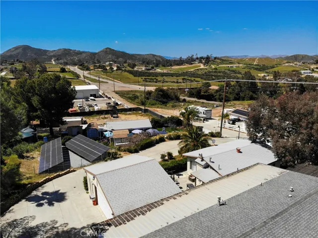 Panoramic hills and mountains surround the property.