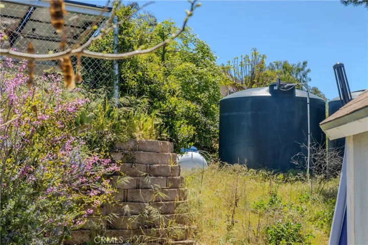2 water well storage tanks.