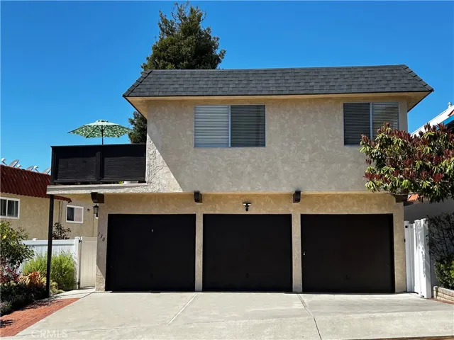 Private garage with long driveway.