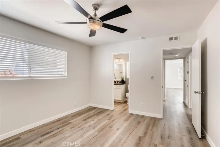 Primary bedroom with 1/2 bath.
