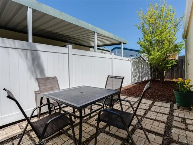 This sunny patio is a great spot for grilling and setting a backyard picnic. In the summer pick ripe plums and apricots from your own trees.