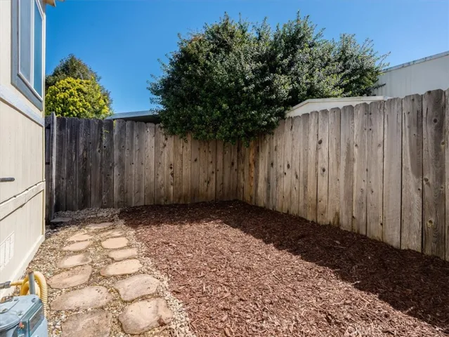 Get creative and plant your own garden or place a bistro table in this wind-protected nook.