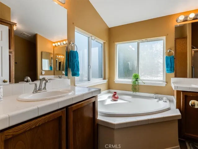 Corner frosted windows give more light, while still offering privacy.
