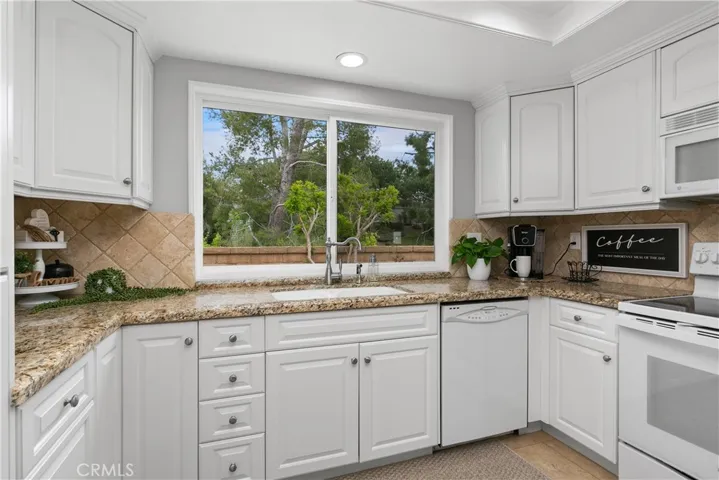 Kitchen w/ tree line view