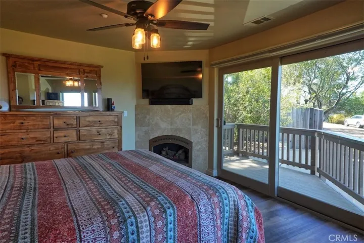 Primary bedroom with​​‌​​​​‌​​‌‌​​‌​​​‌‌​​​‌​​‌‌​​‌‌​​‌‌​​​​ deck