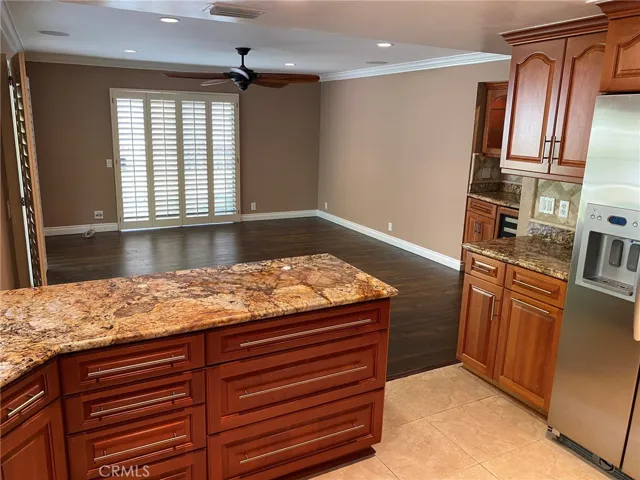 Ample storage in kitchen that opens to the Family Room.