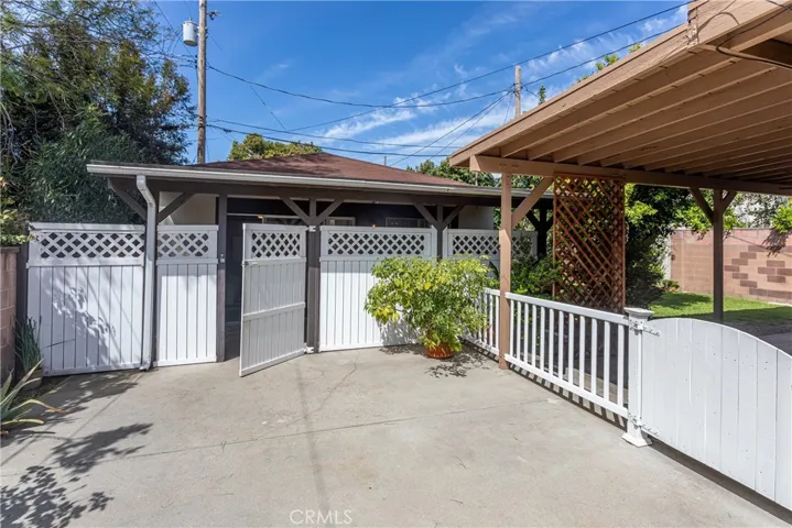 Back of the property has an outbuilding that is approximately 500 sq ft. Currently used as a recreation room with extra storage, it has plumbing roughed in for an easy ADU conversion!