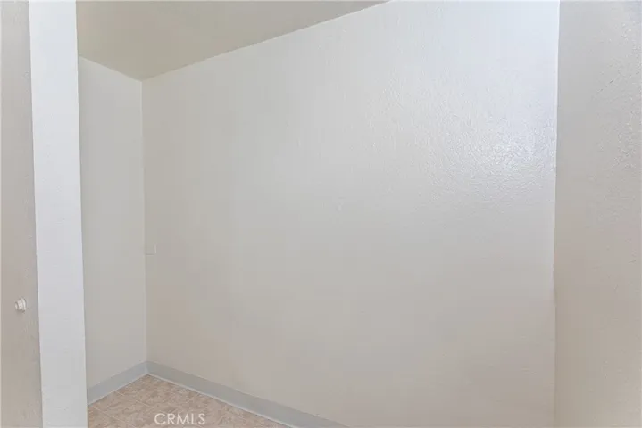 Shower area for potential ADU. Plumbing is capped off inside the floor and wall.