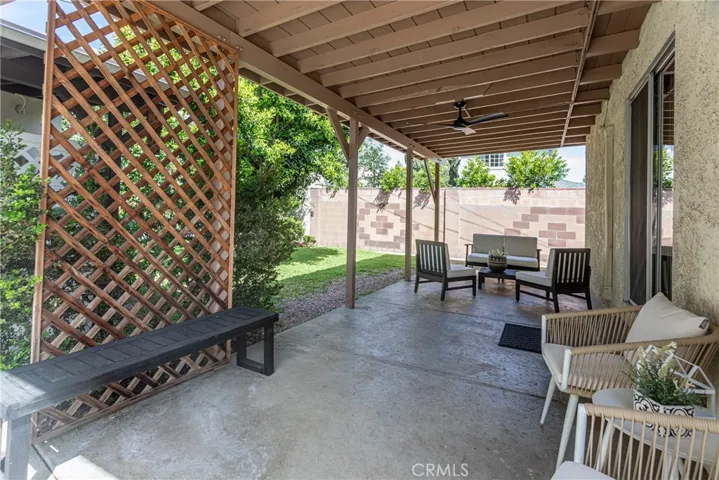 Heading outside we find an outside retreat!  This spacious covered patio is perfect for relaxing or entertaining!
