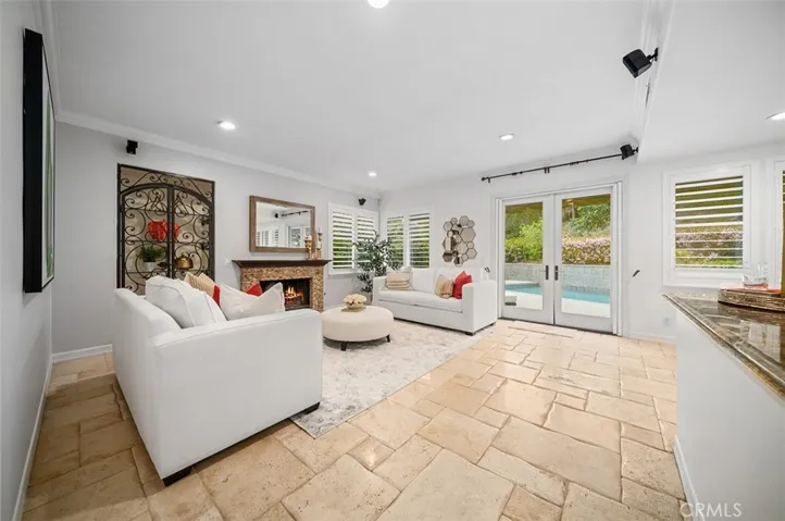 family room with double door to backyard,