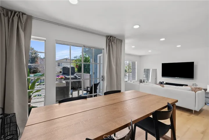 Dining area with sliding door to patio.