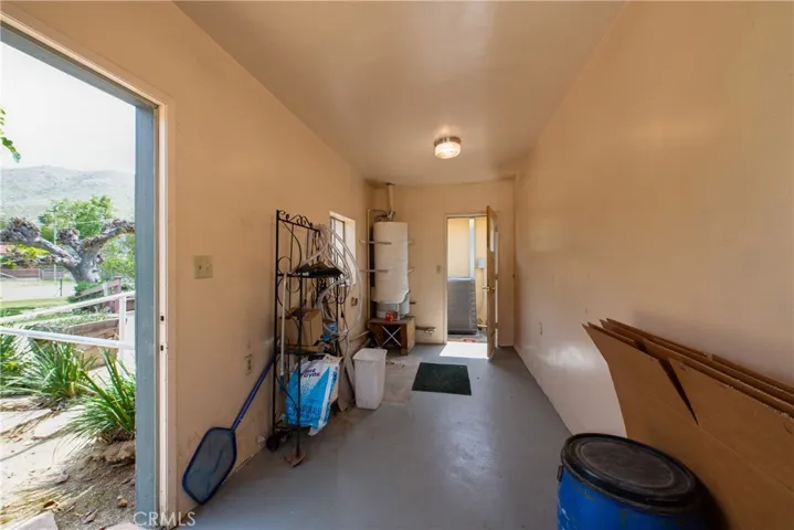 Laundry room behind the garage.
