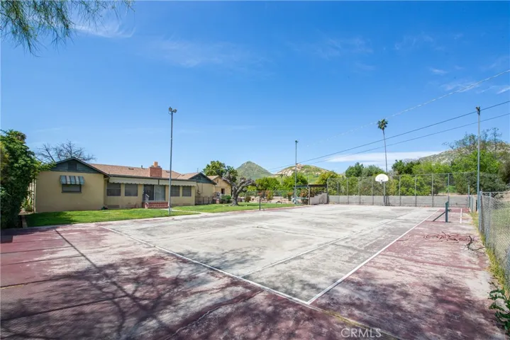 Tennis court, Basketball court, pickle ball court (with a can of paint), volleyball court (with a net) or kids can ride their bikes. Endless ideas.