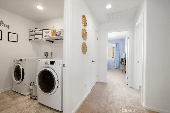 Access to laundry room and two secondary bedrooms and secondary bathroom