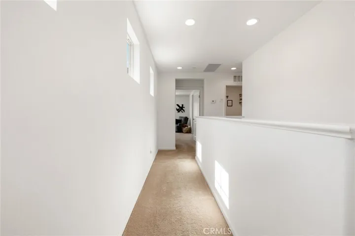 Top of stairs access to the Master bedroom and spare bedrooms