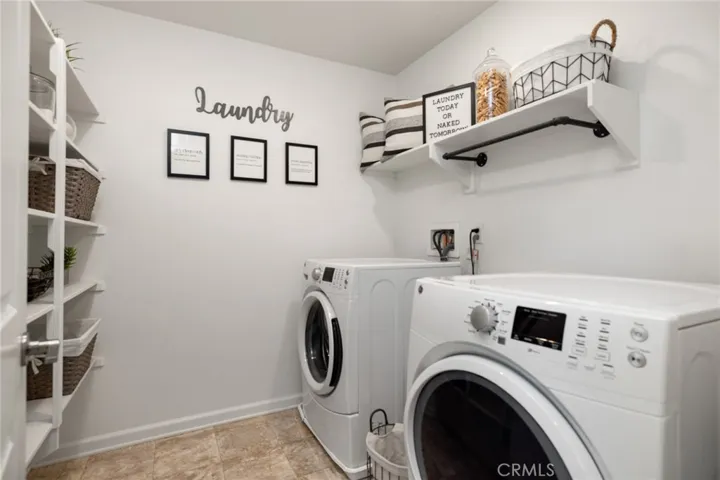 Upper level laundry room with tons of storage
