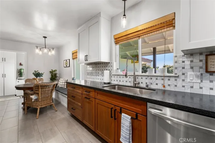 Everyone enjoys standing at the sink and having a view of the front yard, here you have it.