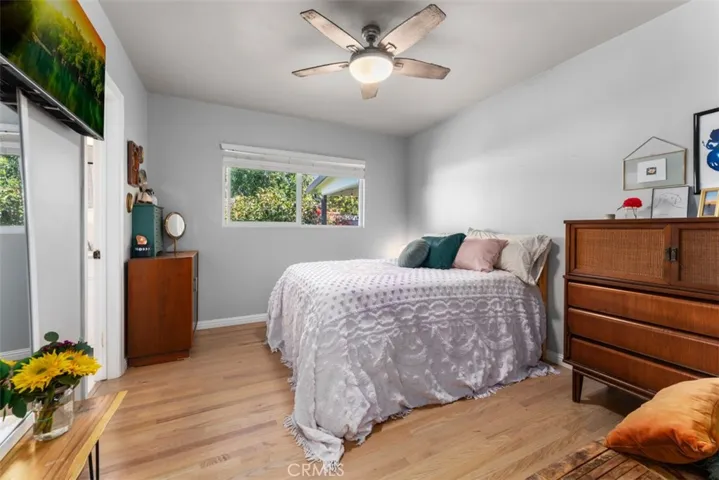 Secondary bedroom with a complete view of the inviting backyard