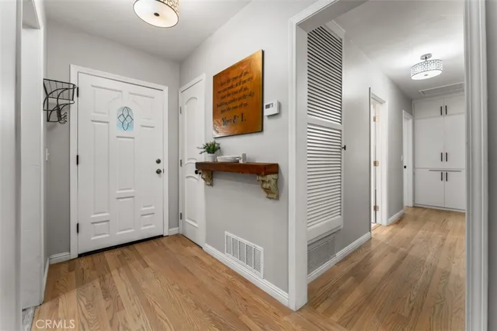 Excellent view of the entrance hall & guest coat closet