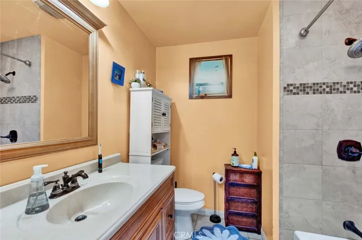 2nd Guest Bedroom With wood Grain Tile Floor also 6 Panel Closet Doors