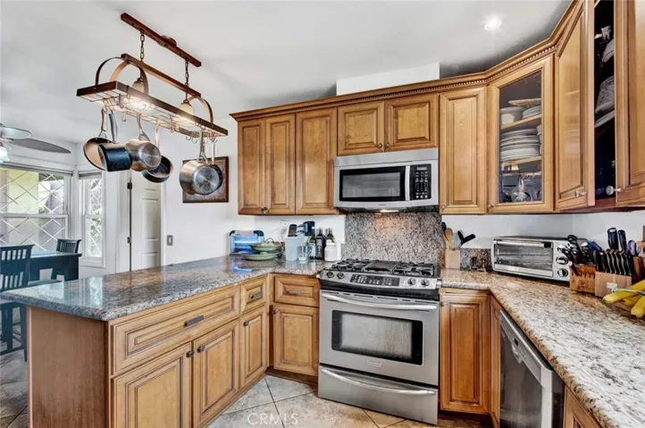 Kitchen with Gas Range And Built In Microwave