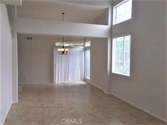 Looking from front door through to the living & dining room.