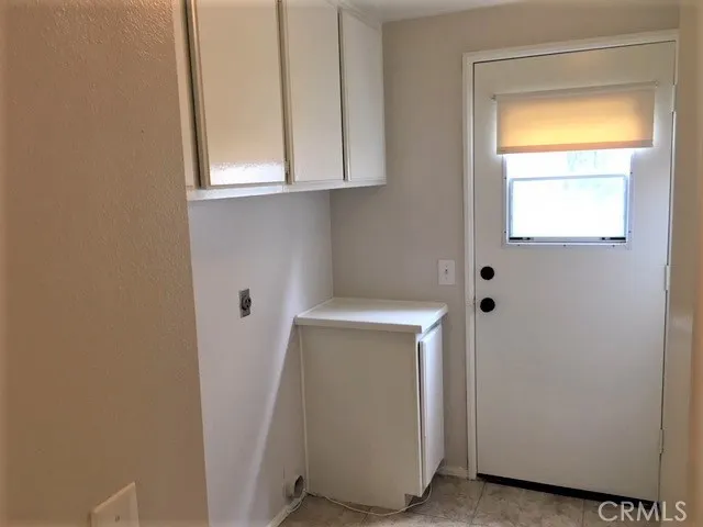 Laundry room with outside access.