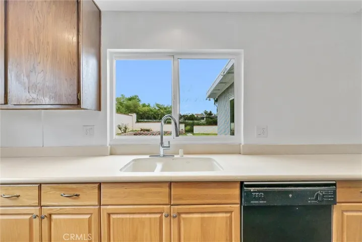 kitchen window into backyard.