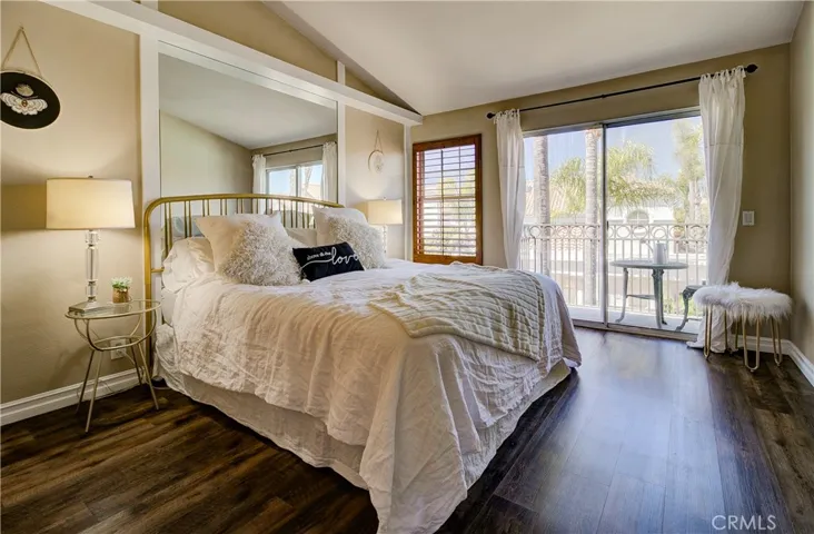 Private, large owners suite! Rich wood-laminate flooring, private balcony.  This room is gorgeous!