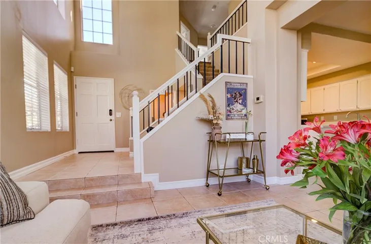 Such an open floor plan. Living room looking back to entry way & kitchen to the right