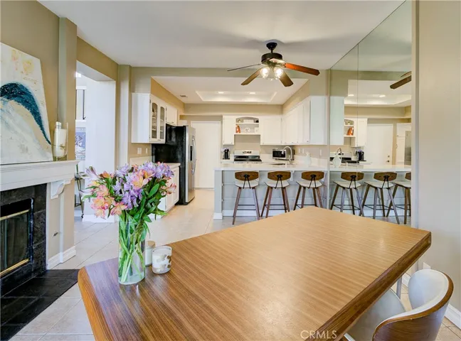 Another view of family room looking into open, bright kitchen.