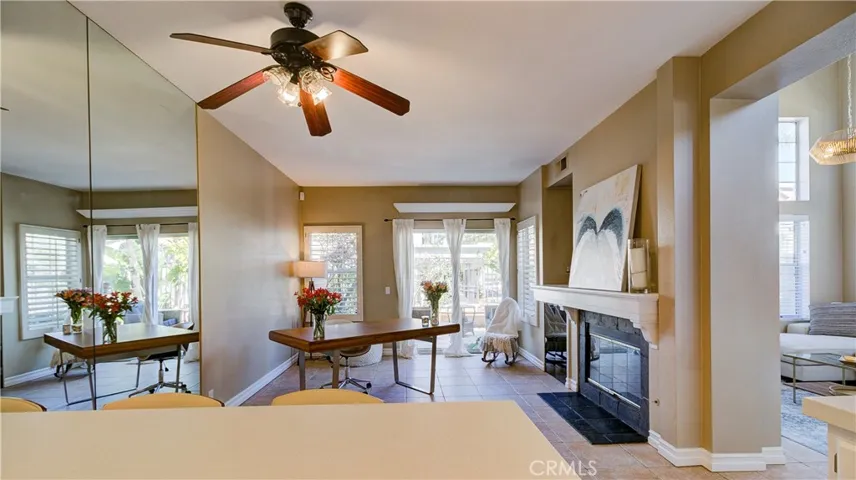 Kitchen bar/counter looking into both family/dining room & to the right, the living room.
