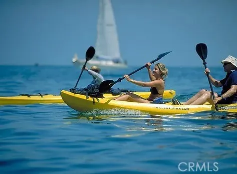 Kayaks fit in the storage boxes at your parking space
