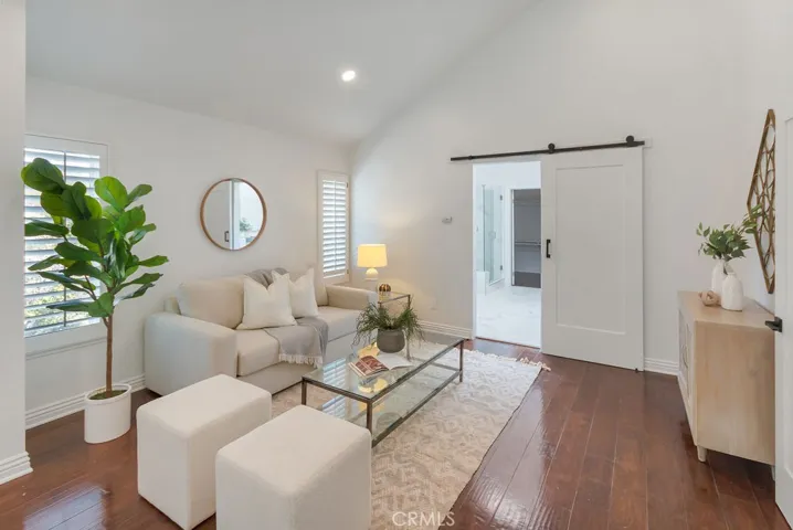 Primary bedroom retreat with view to bathroom