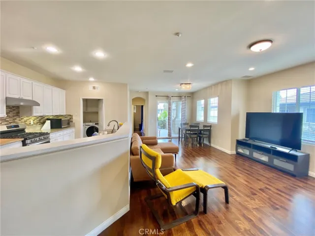 Kitchen opens to living room