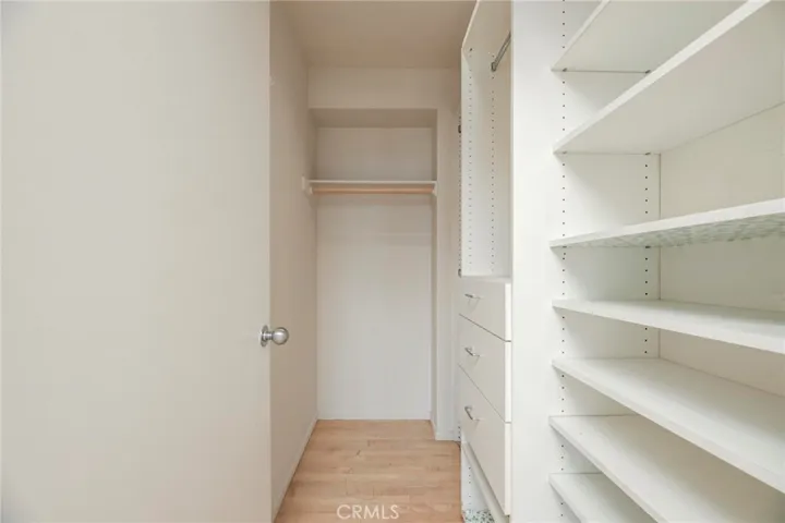 A roomy walk-in closet in the Master's Bedroom.