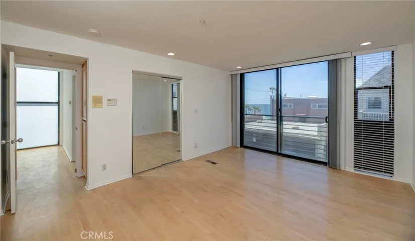 The primary suite and short hallway to Bedroom #2.
