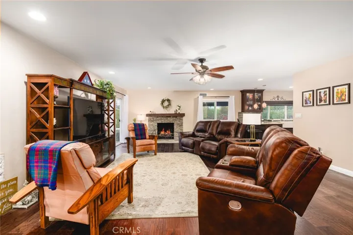 Open and bright living room with cozy fireplace