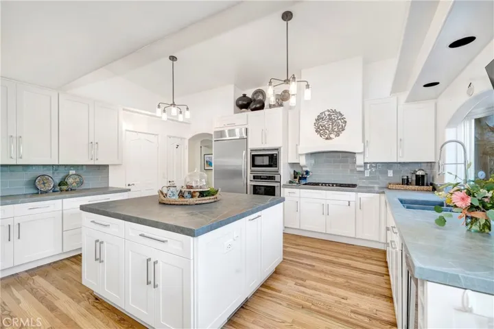 Extra large stone center kitchen island.
