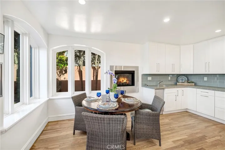 Cozy breakfast nook with fireplace.