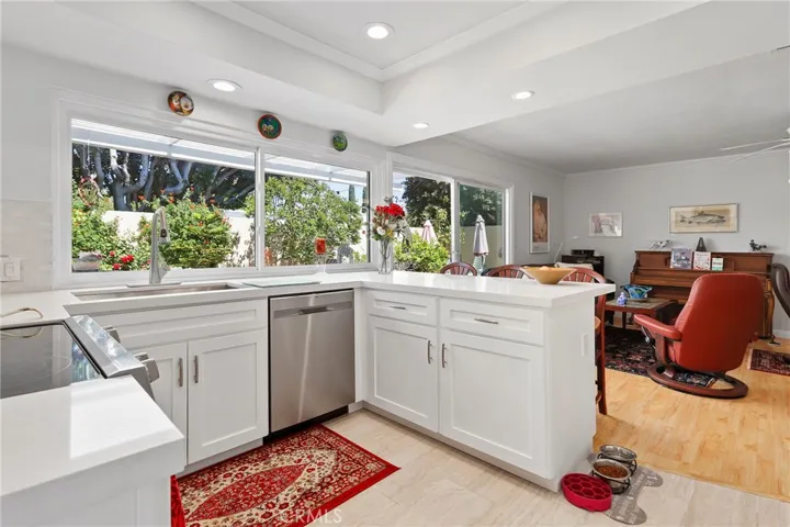new kitchen with shaker cabinets and quartz
