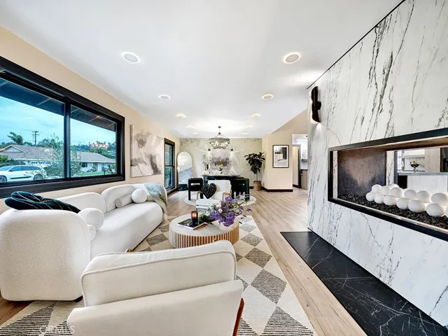 Exceptional attention to details….luxury vinyl floor planks, recessed lighting and designer chandeliers