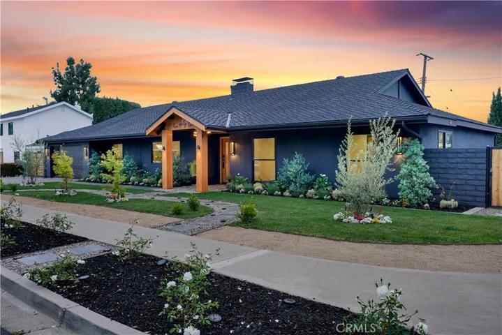 Beautiful landscaping complements the home’s charm