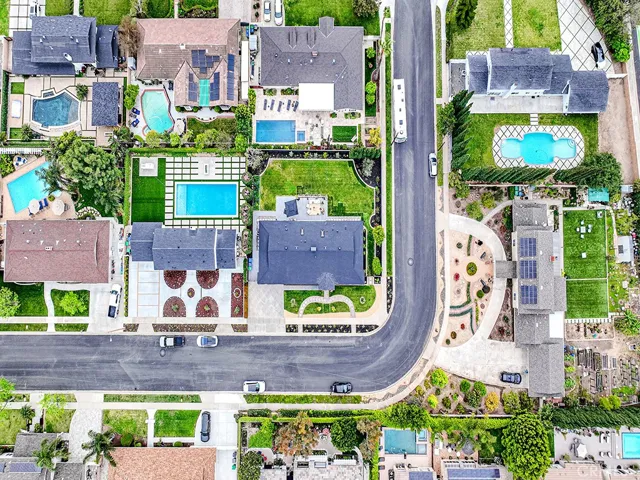 Aerial view of this highly sought after street…property sits on a large corner lot