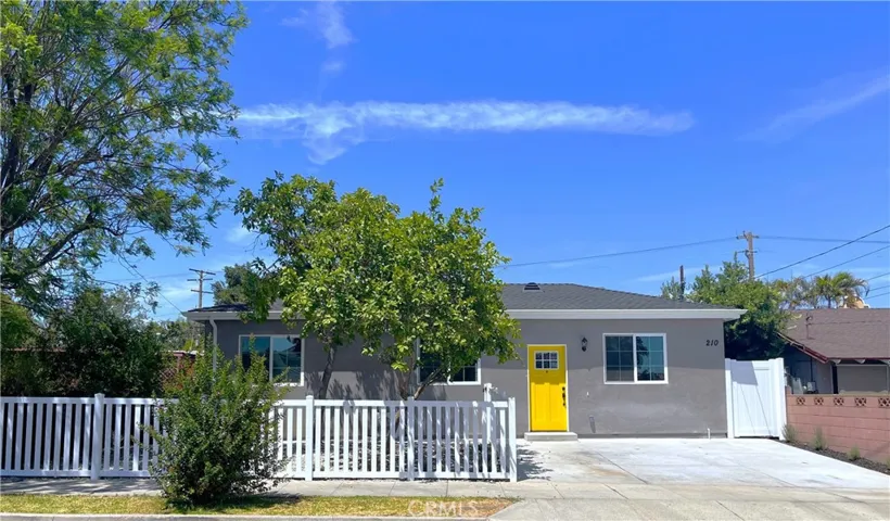 New built Back House with new fenced front yard and driveway.