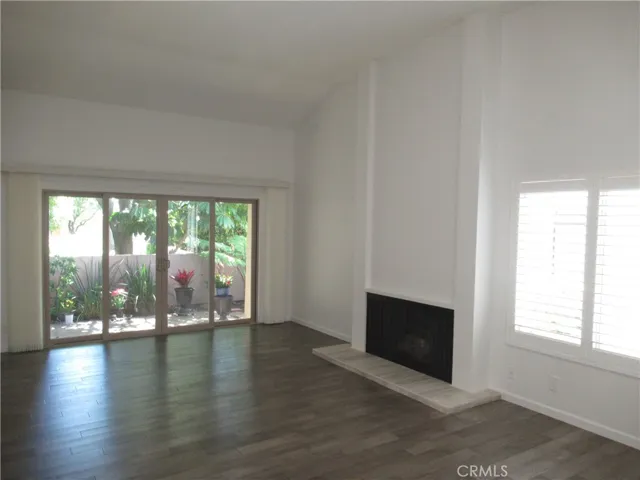 Living Room with Hardwood Floors and Fireplace