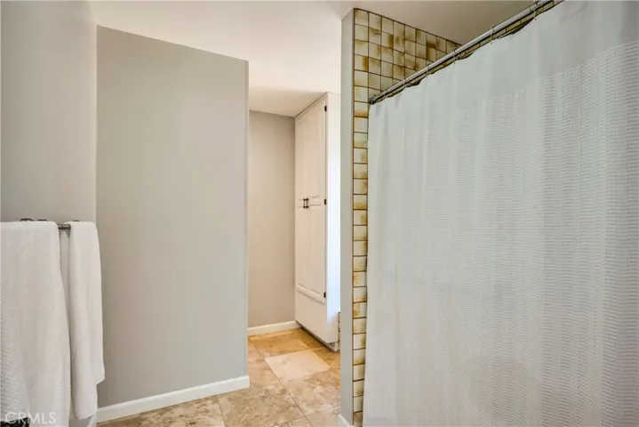 Stall shower & privacy toilet area