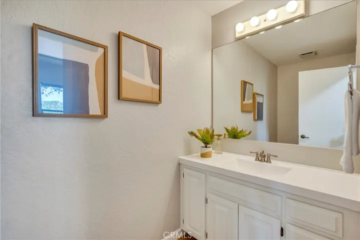 Half bathroom in hallway